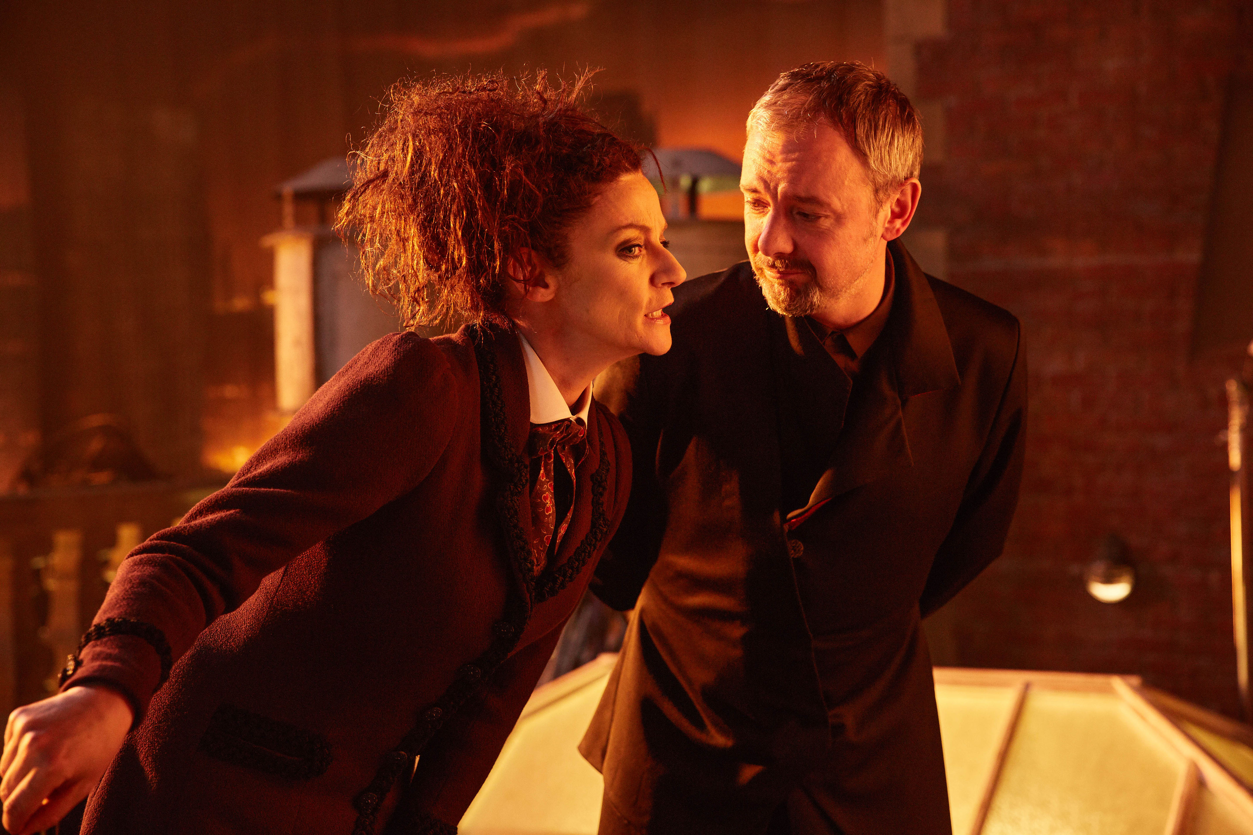 WARNING: Embargoed for publication until 00:00:01 on 27/06/2017 - Programme Name: Doctor Who S10 - TX: 01/07/2017 - Episode: n/a (No. 12) - Picture Shows: ***EMBARGOED UNTIL 00:01hrs 27th JUNE 2017*** Missy (MICHELLE GOMEZ), The Master (JOHN SIMM) - (C) BBC/BBC Worldwide - Photographer: Simon Ridgway WARNING: Embargoed for publication until 00:00:01 on 27/06/2017 - Programme Name: Doctor Who S10 - TX: 01/07/2017 - Episode: n/a (No. 12) - Picture Shows: ***EMBARGOED UNTIL 00:01hrs 27th JUNE 2017*** Missy (MICHELLE GOMEZ), The Master (JOHN SIMM) - (C) BBC/BBC Worldwide - Photographer: Simon Ridgway