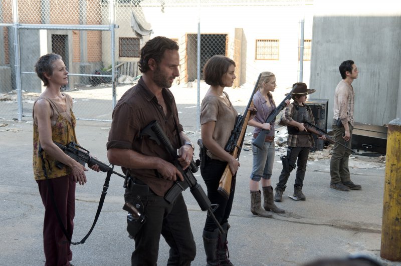 Carol (Melissa Suzanne McBride), Rick Grimes (Andrew Lincoln), Maggie Greene (Lauren Cohan), Beth Greene (Emily Kinney), Carl Grimes (Chandler Riggs) and Glenn (Steven Yeun) - The Walking Dead - Season 3, Episode 11 - Photo Credit: Gene Page/AMC Carol (Melissa Suzanne McBride), Rick Grimes (Andrew Lincoln), Maggie Greene (Lauren Cohan), Beth Greene (Emily Kinney), Carl Grimes (Chandler Riggs) and Glenn (Steven Yeun) - The Walking Dead - Season 3, Episode 11 - Photo Credit: Gene Page/AMC