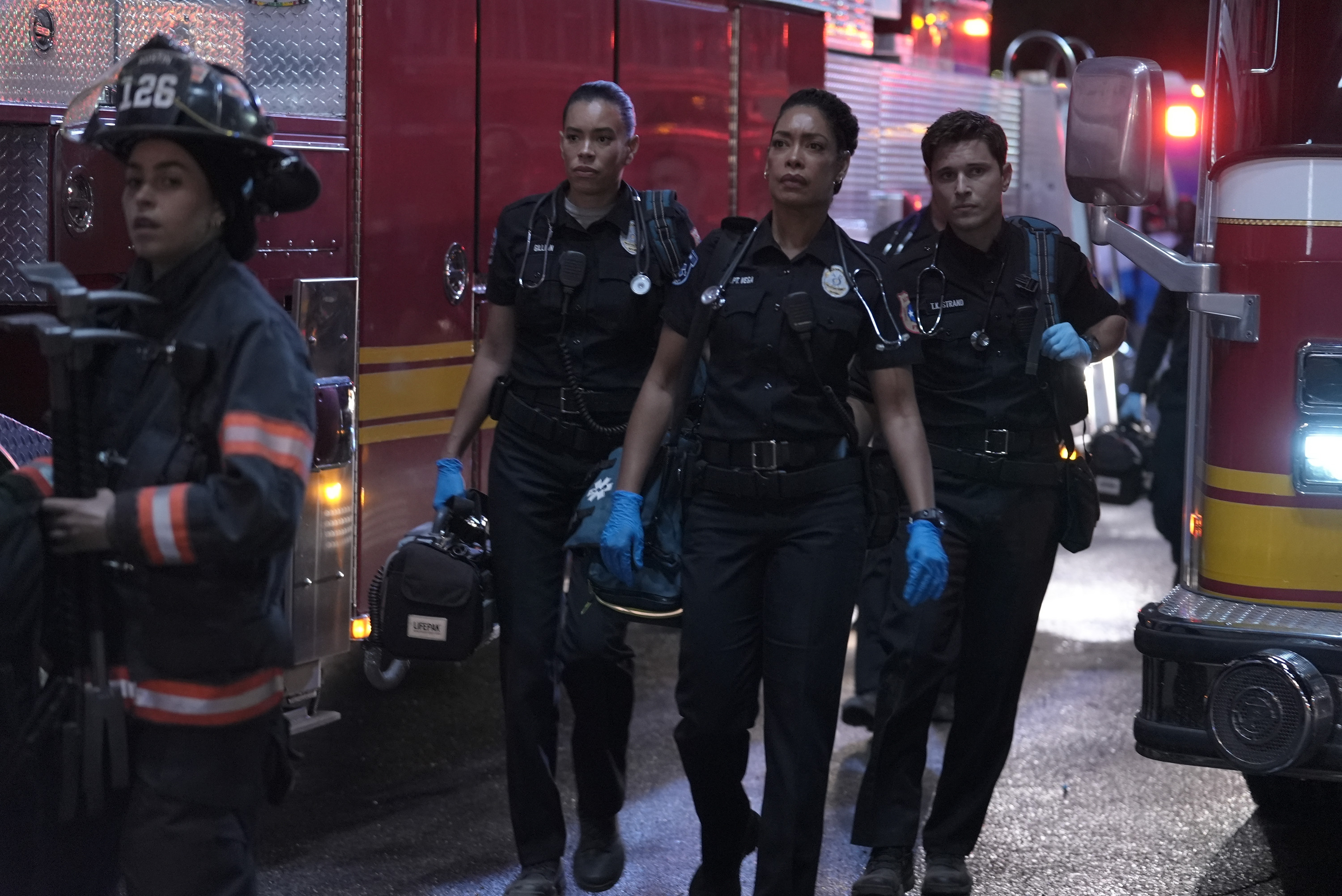 9-1-1 LONE STAR: L-R: Brianna Baker, Gina Torres, and Ronen Rubenstein in the "New Hotness" season premiere episode of 9-1-1 LONE STAR on FOX.© 2023 Fox Media LLC. CR: Kevin Estrada/FOX. 9-1-1 LONE STAR: L-R: Brianna Baker, Gina Torres, and Ronen Rubenstein in the "New Hotness" season premiere episode of 9-1-1 LONE STAR on FOX.© 2023 Fox Media LLC. CR: Kevin Estrada/FOX.