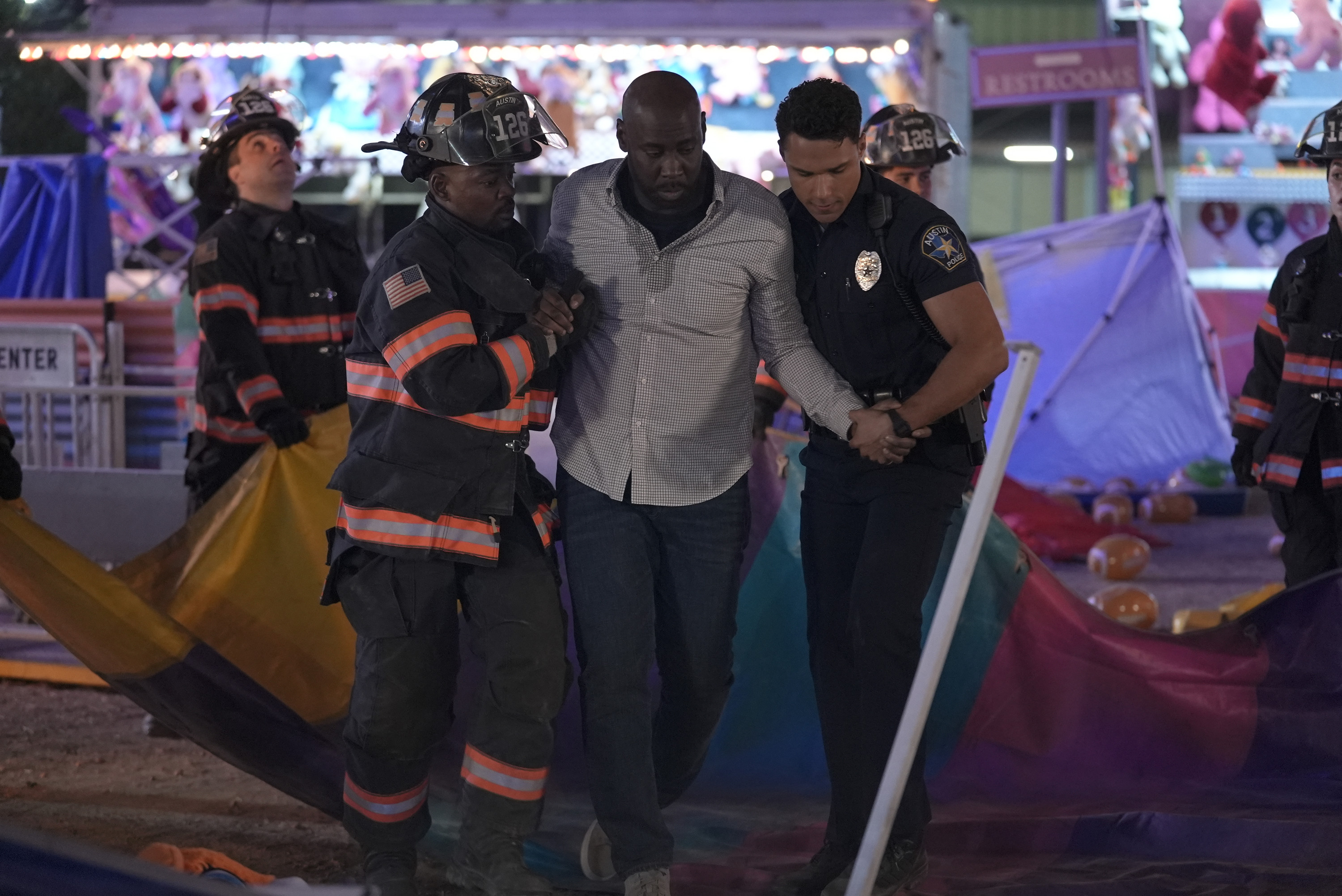 9-1-1 LONE STAR: L-R: Brian Michael Smith, guest star D.B. Woodside and Rafael Silva in the "New Hotness" season premiere episode of 9-1-1 LONE STAR on FOX.© 2023 Fox Media LLC. CR: Kevin Estrada/FOX. 9-1-1 LONE STAR: L-R: Brian Michael Smith, guest star D.B. Woodside and Rafael Silva in the "New Hotness" season premiere episode of 9-1-1 LONE STAR on FOX.© 2023 Fox Media LLC. CR: Kevin Estrada/FOX.